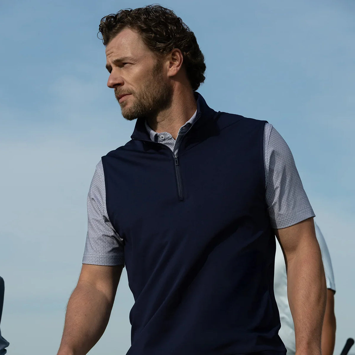 Player 2.0 Quarter Zip Vest in Halo navy, worn by a model over a grey shirt