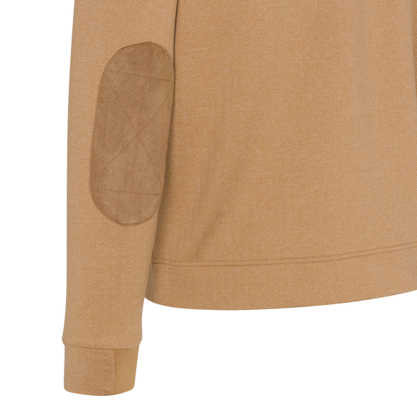 Close-up of a beige jacket with a patch on a white background