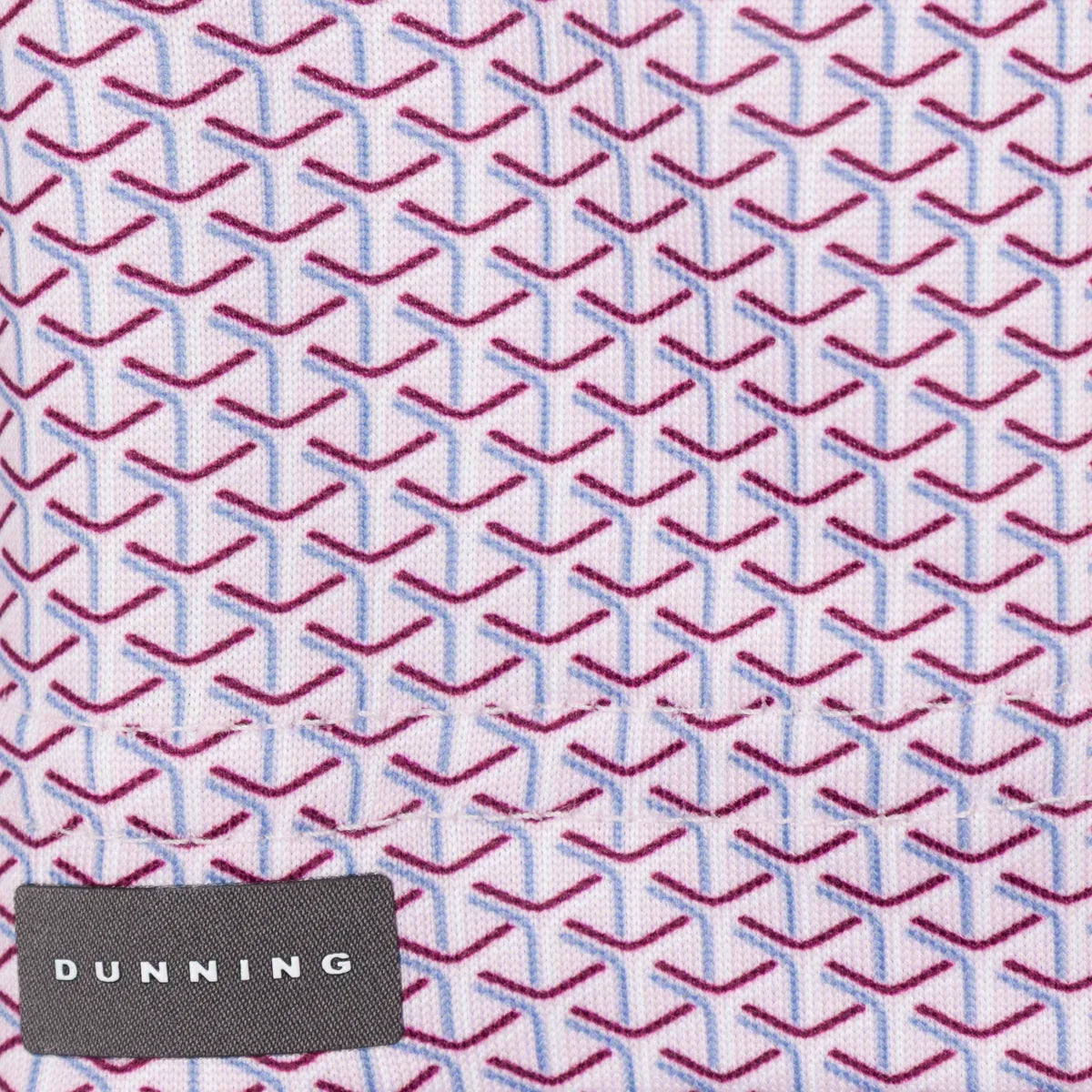Siegel Jersey Performance Polo burgundy and light blue geometric print with Dunning label, close-up
