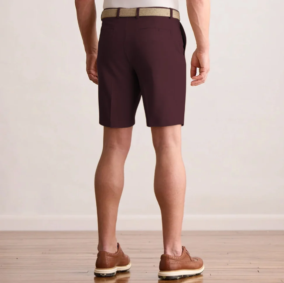Player Fit Woven 9" Short in dark cabernet, back view on model