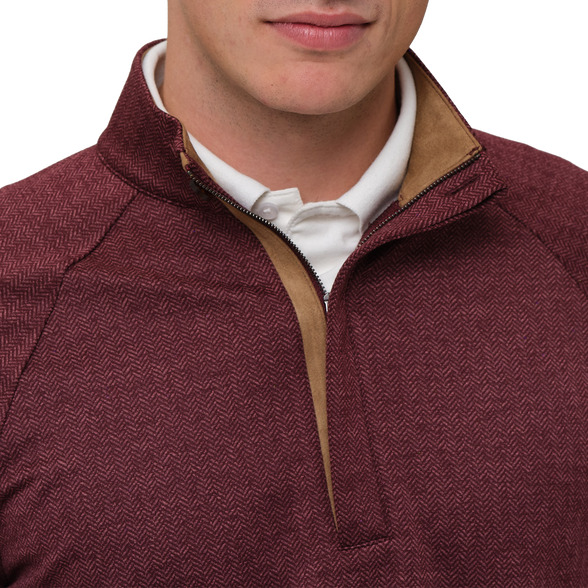 Maroon half-zip sweater with brown zipper and white shirt underneath on a white background
