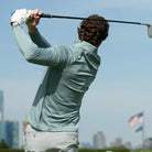 Quest Contour Quarter Zip in Slate Green, worn by a model mid golf swing
