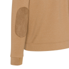 Close-up of a beige jacket with a patch on a white background