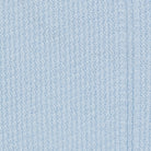 Close-up of a textured light blue fabric surface