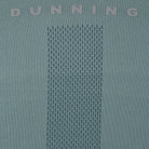Textured fabric with a pattern and 'Dunning' branding on a blue background
