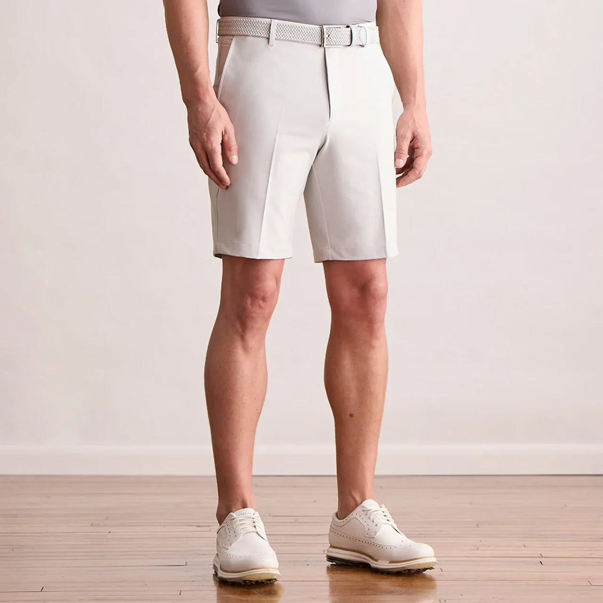 Player Fit Woven 9" Short in microchip, front view on model