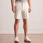 Player Fit Woven 9" Short in stone, front view on model