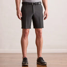 Player Fit Woven 9" Short in black, front view on model