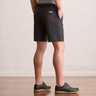 Player Fit Woven 9" Short in black, back view on model