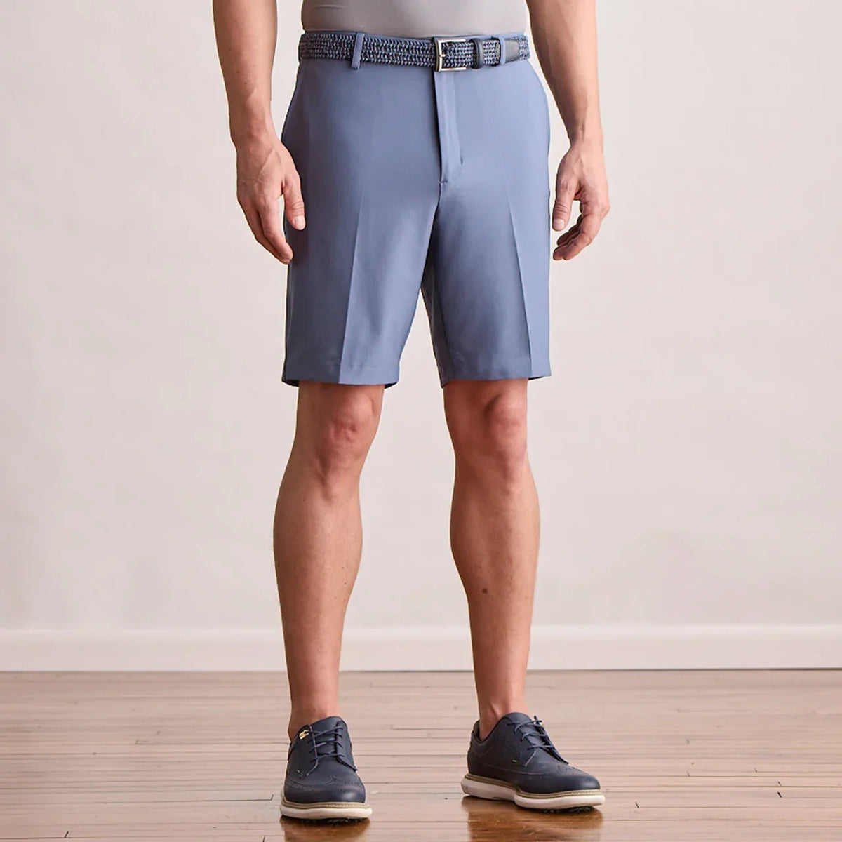 Player Fit Woven 9" Short in vintage indigo, front view on model