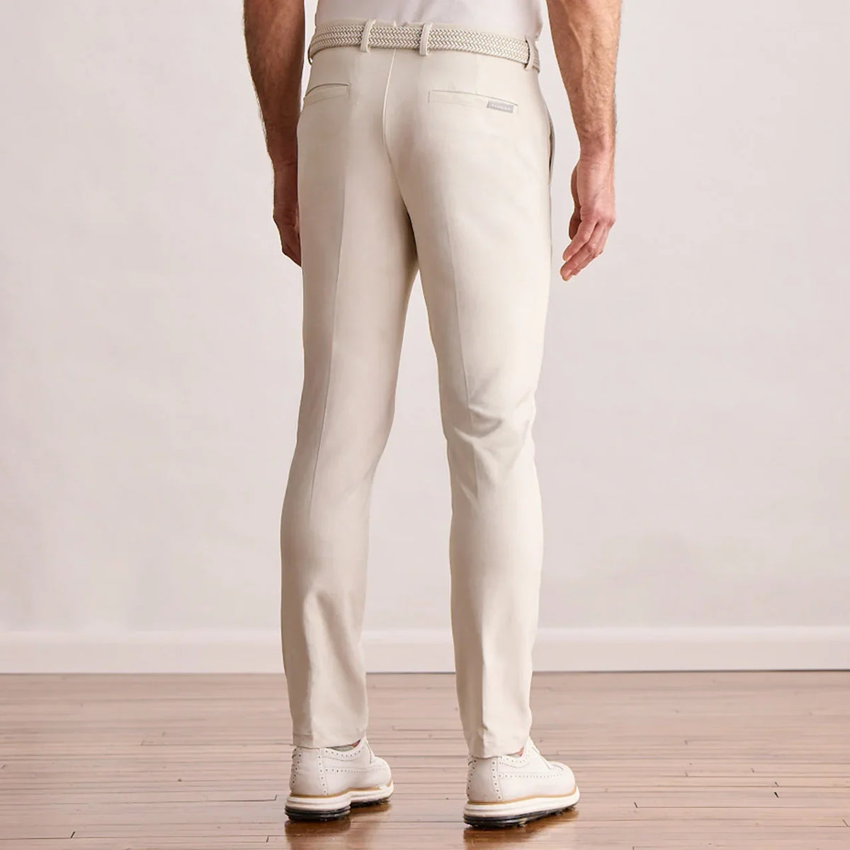 Modern Player Fit Performance Pant in stone, back view on model