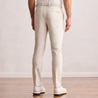 Modern Player Fit Performance Pant in stone, back view on model