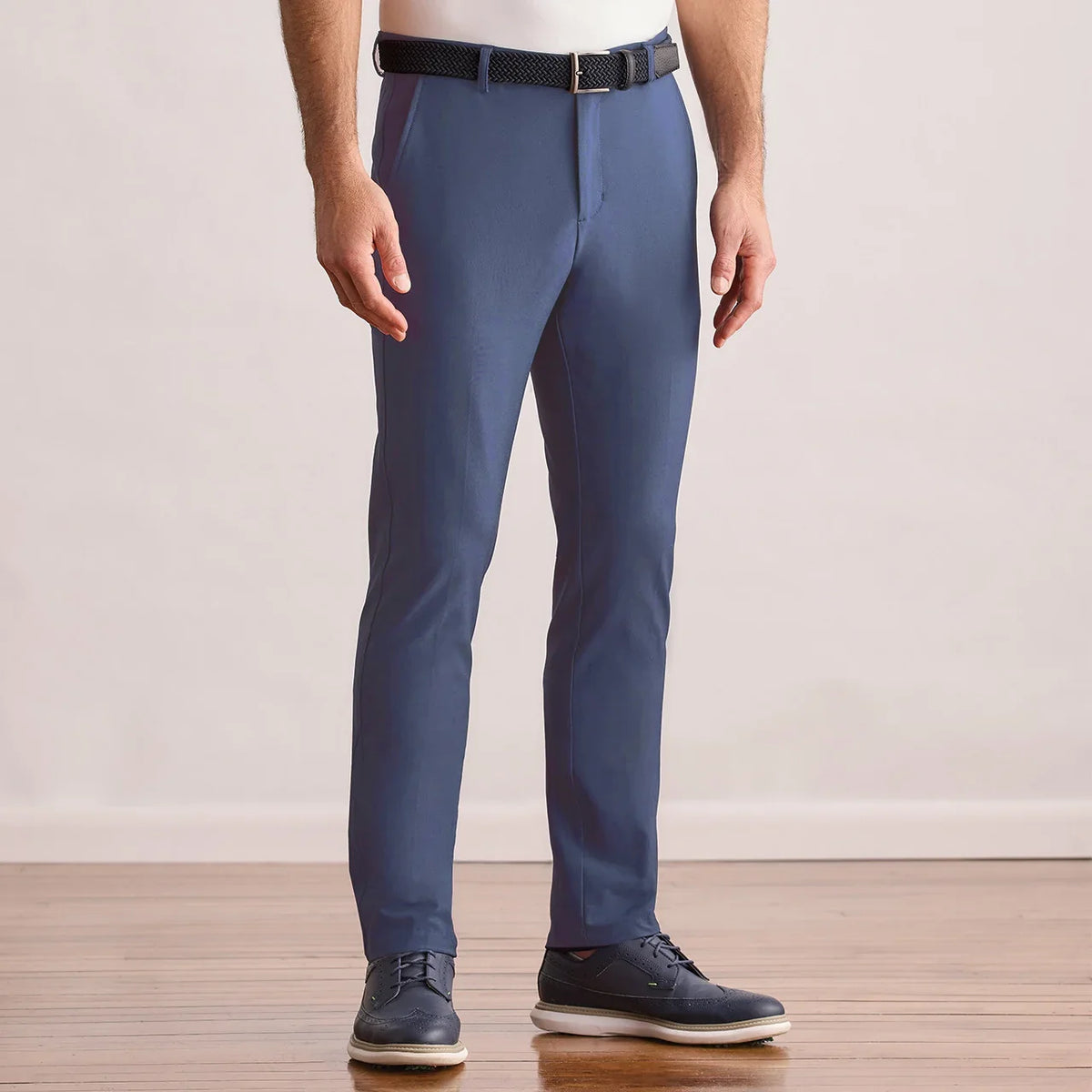 Modern Player Fit Performance Pant in vintage indigo, front view on model