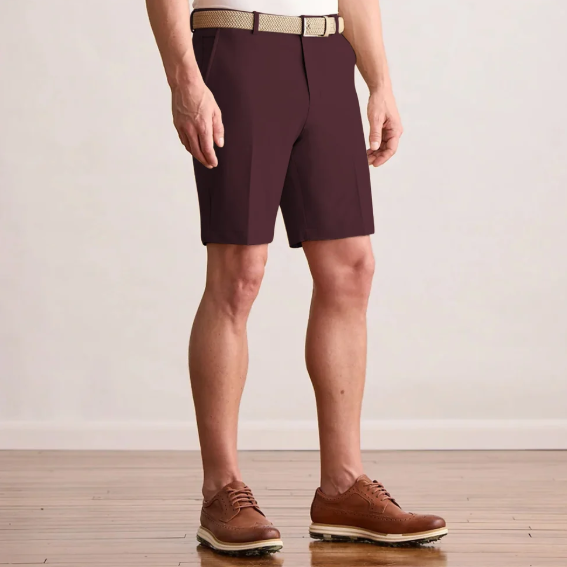 Player Fit Woven 9" Short in dark cabernet, front view on model