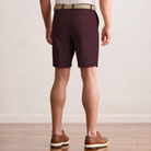 Player Fit Woven 9" Short in dark cabernet, back view on model