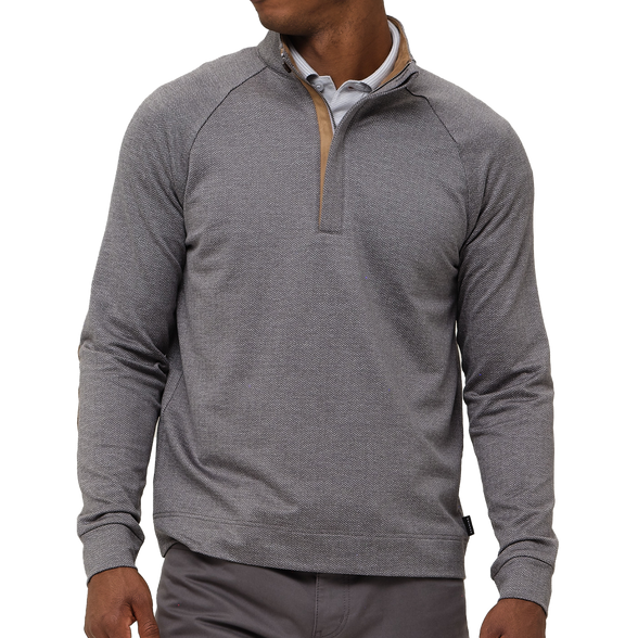 Man wearing a gray half-zip pullover on a white background