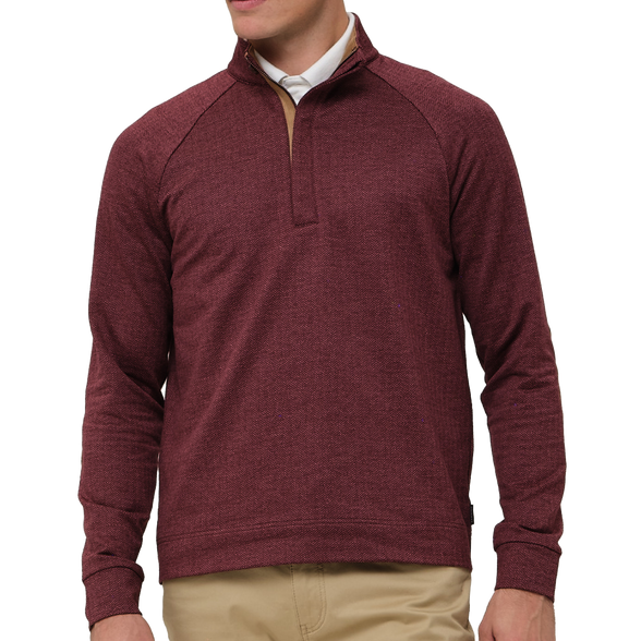 Maroon long-sleeve shirt worn by a person on a white background