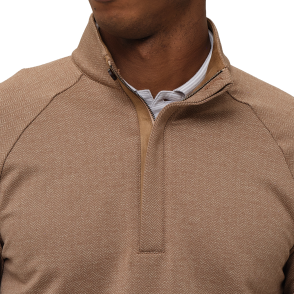 Close-up of a brown quarter-zip pullover with a white shirt underneath on a white background